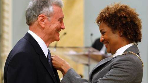 Kenneth Kernaghan receives the Order of Canada from Governor General Michaelle Jean.
