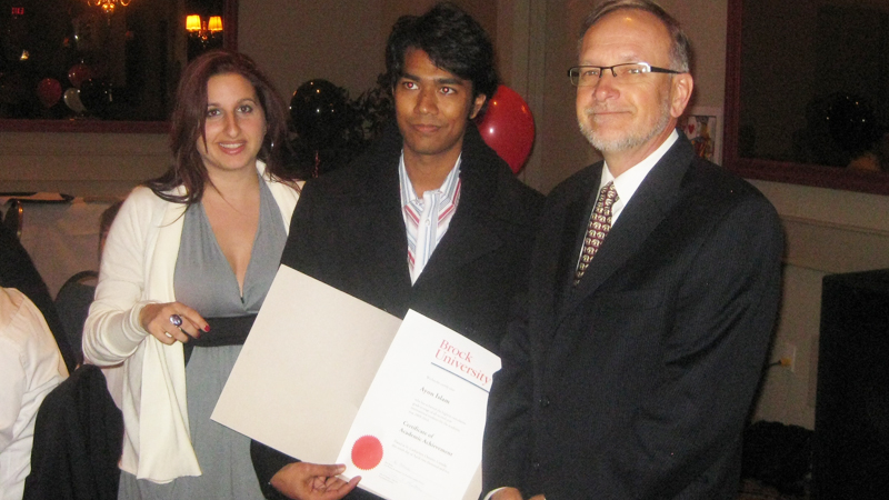 From left: Pranoy Chowdhury; John Kaethler, director of International Services; Christina Bosilo, international programs co-ordinator