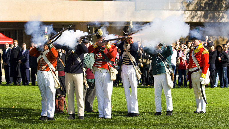 Uniformed re-enactors from the 41st Regiment of Foot Fife and Drum Corps fire three musket shots in a traditional salute to Maj.-Gen. Isaac Brock who died Oct. 13, 1812 in the Battle of Queenston Heights.
