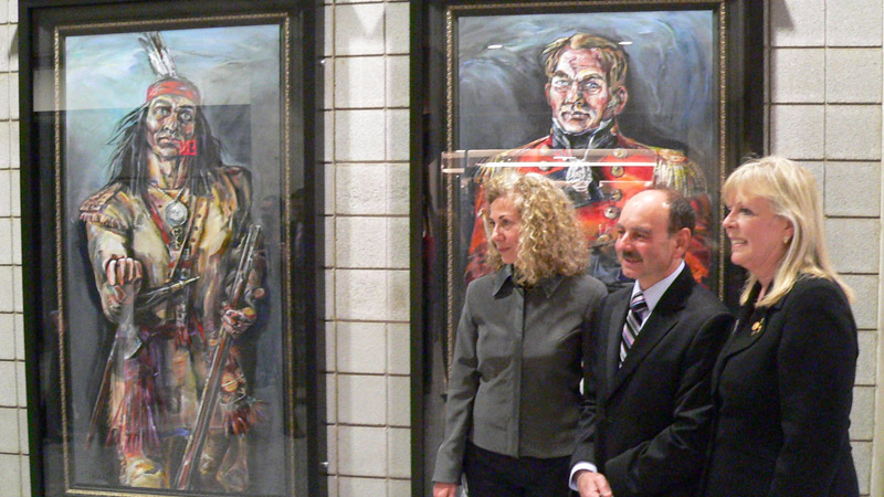 Artist Gertrude Kearns, left, Brock University President Jack Lightstone and patron Kathryn Langley Hope were on hand Friday Oct. 15 for the unveiling of Kearns’ striking portraits of War of 1812 heroes Chief Tecumseh and Maj.-Gen. Sir Isaac Brock. The paintings will remain at the University for up to three years while renovations are being done at the Royal Canadian Military Institute in Toronto.