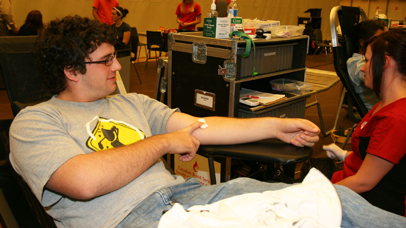 Sam Shannon, a first-year Psychology student, gives blood.