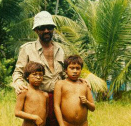 Bert D'Amico is photographed with two Yanomama children.