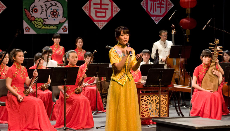 Jing Liu, a Nanjing University English major, sings and acts as master of ceremonies during Sunday's performance.
