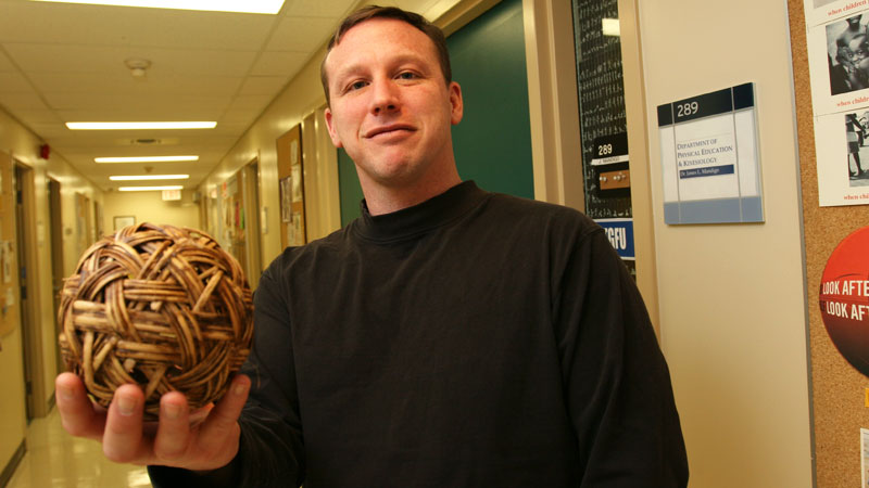 James Mandigo, shown here with a takraw ball, has boosted physical education in violence-ridden El Salvador.