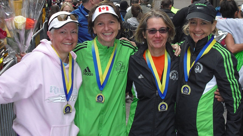 Barb Davis poses with her co-runners after the Boston Marathon. From left: Cathy Hopkins, Cathy Belice, Klari Kalkman and Davis