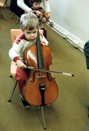 A boy playing the cello. Photo from the Bradley Institute collection, Brock Special Collections and Archives