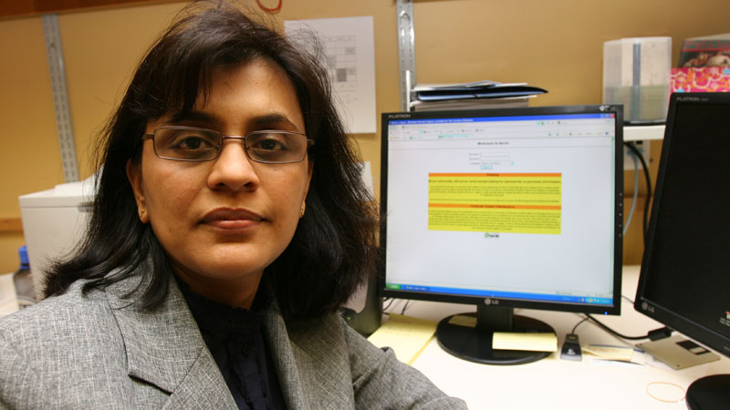 Everyone is susceptible to a phishing attempt, says Teju Herath, shown here with a warning from Brock's ITS department about giving out user names and passwords.