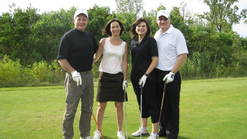 A foursome at the BUAA Golf Tournament