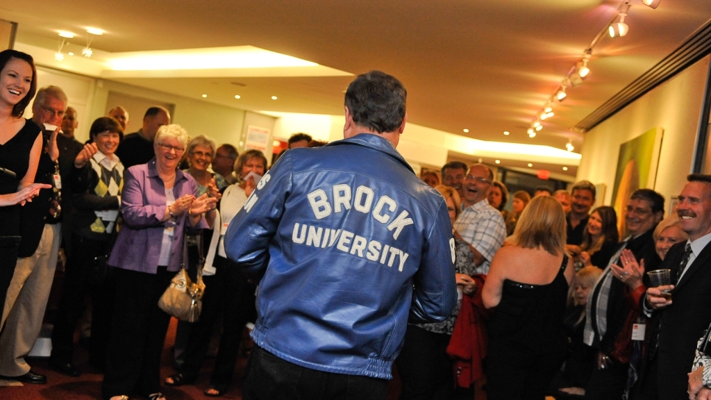 A Brock University alumnus sported his vintage school jacket at the Cameo Club ceremony