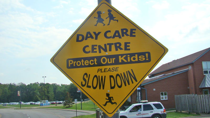 sign encouraging motorists to slow down