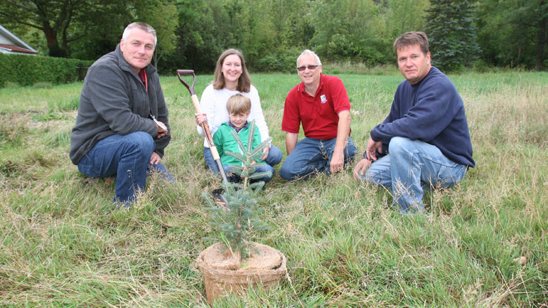 (From left) John Dick, Grounds Services manager; Stephanie Mather, Branch Manager TD Canada Trust, and her five-year-old son Benjamin; Michael Rose, stewardship co-ordinator for Land Care Niagara; Bob Rattew, Grounds Services lead hand.
