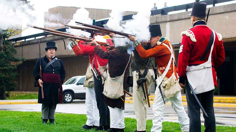 Re-enactors fire muskets at the flag lowering and commemoration of Maj.-Gen Sir Isaac Brock.