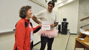 David Gabriel, right, presents a cheque to Lucie Thibault, faculty co-chair of Brock's United Way campaign.