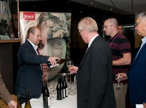 Richie Roberts (BSc, ’06), Fielding Estate Winery Winemaker, pours a glass of Fielding Estate 2010 Chardonnay for alumni