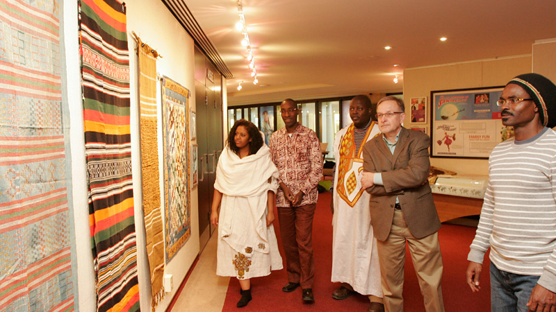 Members of the Brock/Niagara African Renaissance Group - student Rihan Rahsi; Jean Ntakirutimana, Richard Ndayizigamiye, professors of Modern Languages, Literatures and Cultures; John Kaethler, director of International Services and Programs Abroad, and Tamari Kitossa, Sociology professor, members of the Brock/Niagara African Canadian Renaissance Group, look at an exhibit of African cloth and underground quilts at the Sean O'Sullivan Theatre. The exhibit was curated by Visual Arts alumnus Nathan Heuvingh.