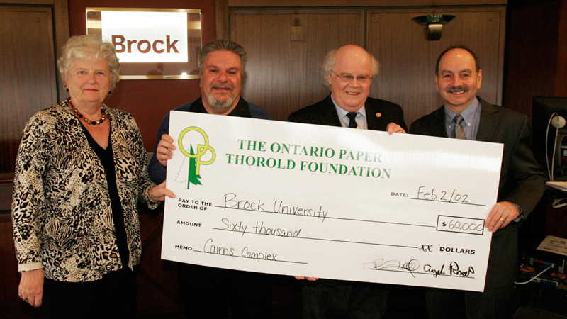 From left: Joy Rogers, chair of Brock's Advancement, Community Relations and Research committee; Angelo Ruscitti, trustee with The Ontario Paper Thorold Foundation; Ross MacDonald, trustee of The Ontario Paper Thorold Foundation, and President Jack Lightstone