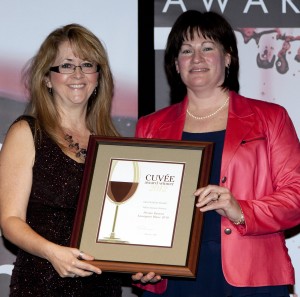 Barb Tatarnic, left, Continuing Education coordinator at CCOVI, presented OEVI grad Mary McDermott, right, of Peller Estates Winery, with the gold award in the category of Sauvignon Blanc
