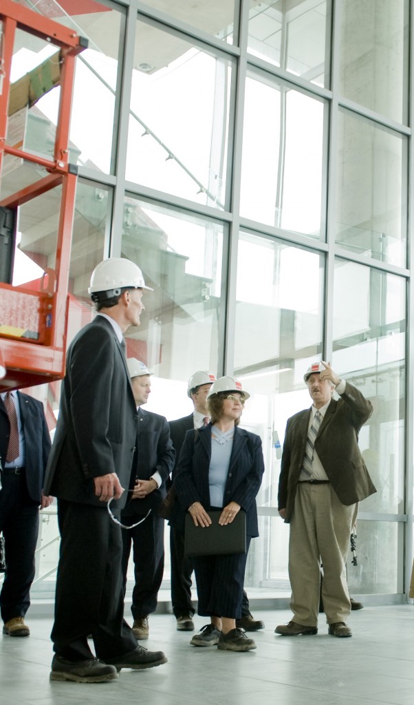 Representatives from Scotiabank and Brock University tour the soon-to-be-opened Cairns Family Health and Bioscience Research Complex prior to the May 7 gift announcement