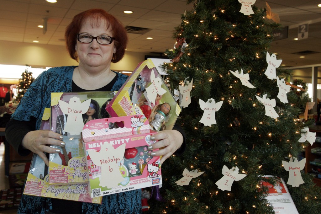 Tacey Atkinson shows off some of the toys that have been donated to the Adopt an Angel toy drive for Community Care of St. Catharines and Thorold. The drive runs until Nov. 26. 