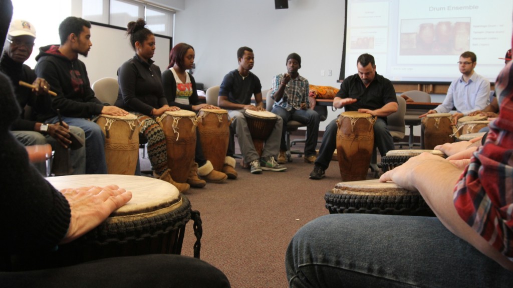 Staff and students participate in a West African drumming workshop with ethnomusicologist Gavin Webb. Webb is one leading two of several workshops during Brock's edition of International Development Week. 
