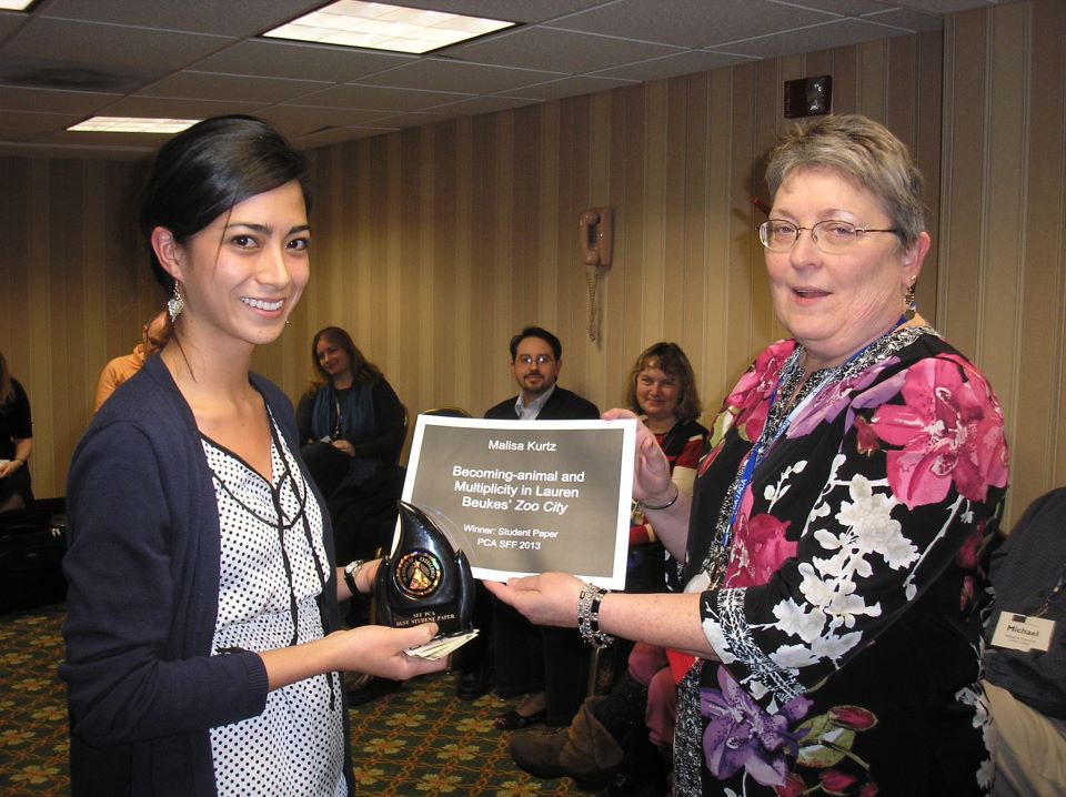 Malisa Kurtz receives her Graduate Student Scholar Award at a recent conference in Washington, D.C.