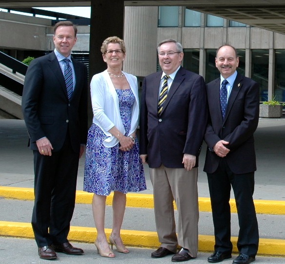 Board of Trustees Chair Joe Roberston, far left, and University President Jack Lightstone, far right, were on hand June 15 to welcome Ontario Premier Kathleen Wynne and St. Catharines MPP Jim Bradley on their visit to Brock.