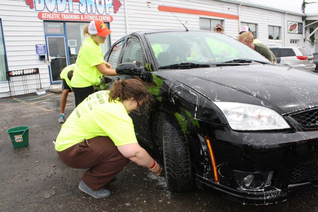Students wash a car in St. Catharines as part of Shinerama last year. BUSU will host Shine Niagara Aug. 25, a scaled down Shinerama, to warm up for the big event in September. event 