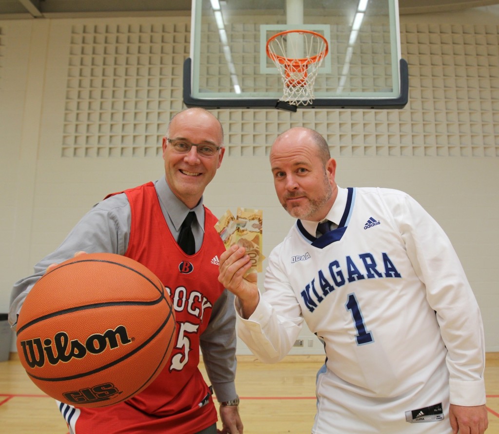 Brian Hutchings (left) Brock's Vice-President of Finance, and Sean Kennedy, Niagara College's VP of Student and External Relations, have a wager on Friday's fourth annual Peninsula Hoops Classic. 