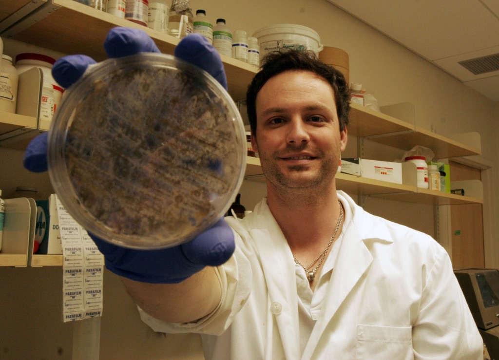 Graduate student Scott Behie with his fungus. Behie won a prestigious student award from the Society of Invertebrate Pathology last month.