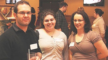 Three of the six Waterloo-Wellington Brock Alumni Network committee members gather at the Huether Hotel for a social with fellow grads.  From L-R: Ted Soepboer, Melissa Campion and Amaris Gerson.
