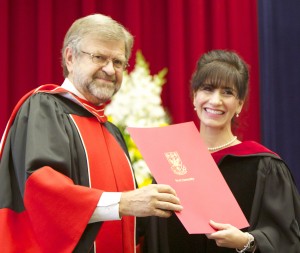 Murray Knuttila  (left), Provost and Vice-President Academic, presents Darlene Ciuffetelli Parker, a professor in the Department of Teacher of Education, with the award for distinguished teaching at the afternoon ceremony.