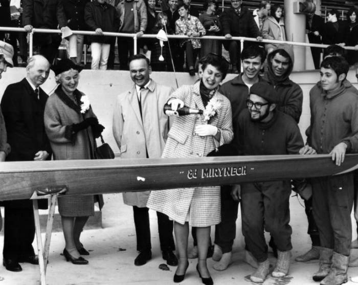 Anne Mirynech is pictured here christening the "Ed Mirynech", named after her husband who was the rowing moderator and former acting director of athletics
