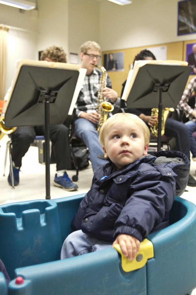 Tyler Graham takes in the action during a musical performance by Prof. Zoltan Kalman's woodwinds techniques class recently. Graham attends the Rosalind Blauer Centre for Child Care where staff are exposing the children to different types of music. 