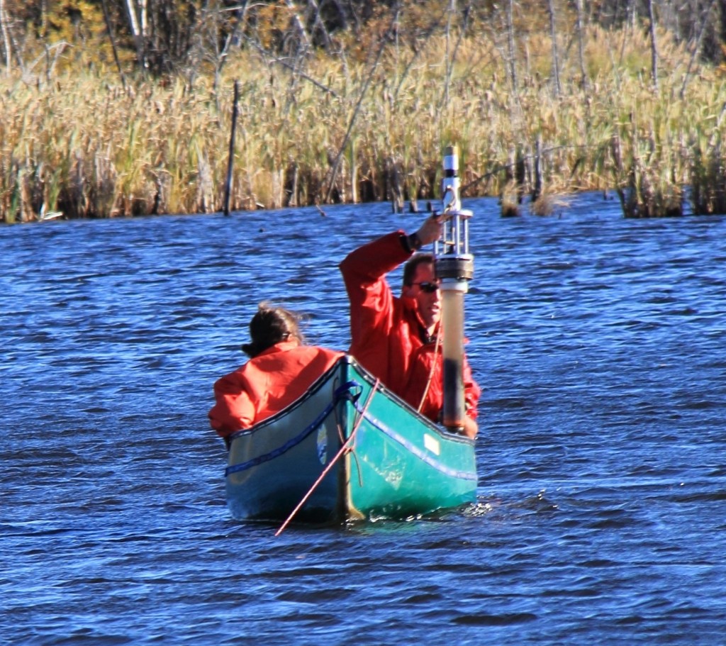 Thienpont and a colleague in a sediment corer canoe. Image by Linda Kimpe (University of Ottawa). 
