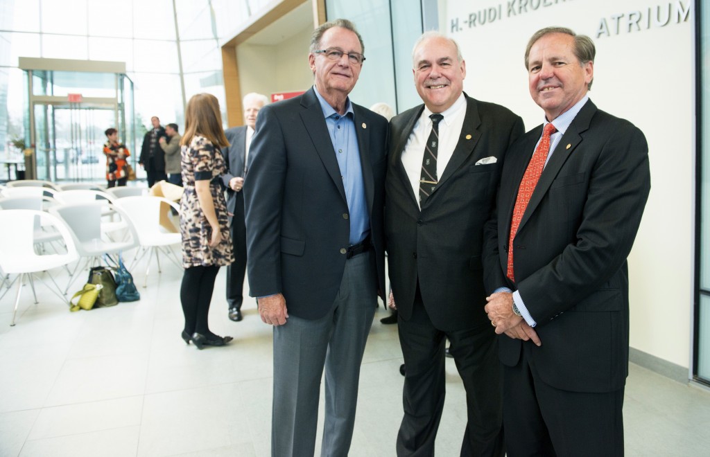 Dave Howes, left, in November 2014 with former Board of Trustees chair Rudi Kroeker, centre, and current chair John Suk.