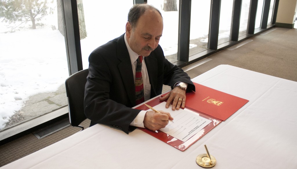Brock President Jack Lightstone signs an agreement that will see the University receive $500,000 over four years for Queen Elizabeth II Diamond Scholarships that will ultimately create placements in Brock's new Sport Leaders International Internship course.  