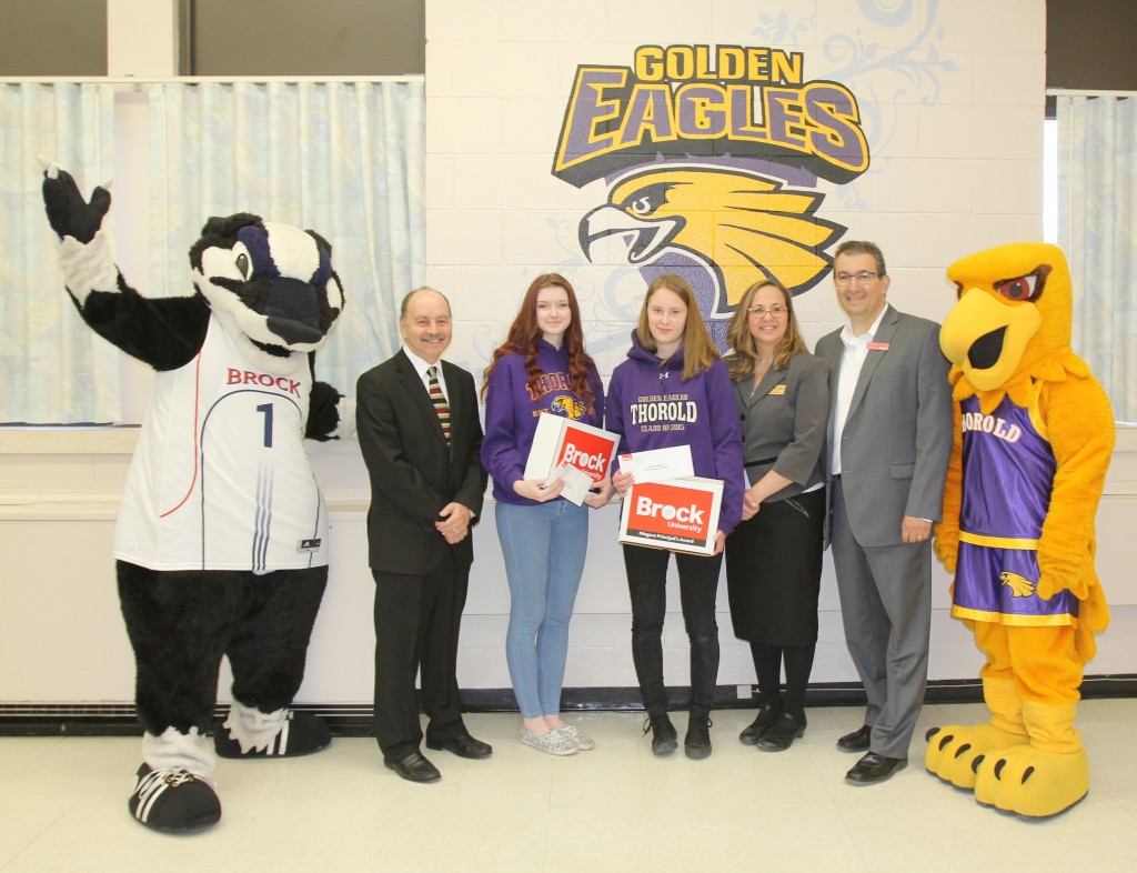 The mascots for both Brock University and Thorold Secondary School were on hand Tuesday morning as Brock presented its Niagara Principal's Scholarhips to two students. Pictured between the mascots from left are: Brock President Jack Lightstone, recipients Sasha Vince and Isabel Skeffington, TSS Principal Helena Tritchew and Brock Director of Student Awards and Financial Aid Rico Natale.