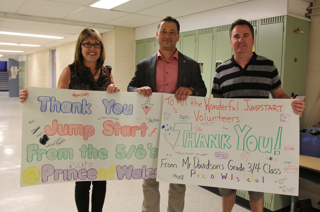 Prince of Wales teacher Jon Davidson (right) thanks Nancy Cameron and Dave DiFelice of Canadian Tire Jumpstart. 