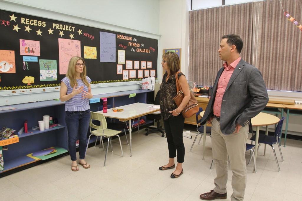 Caroline Macdonald, educator and regional co-ordinator of the Recess Project, gives Nancy Cameron and Dave DiFelice of Canadian Tire Jumpstart a rundown of everything students do and learn during organized recess activities at Prince of Wales School in Thorold.