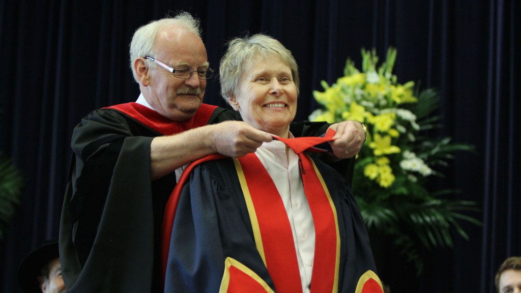 Prof. Alan Castles hoods Dr. Roberta Bondar at Friday's convocation ceremony where she was presented with an honorary degree. 