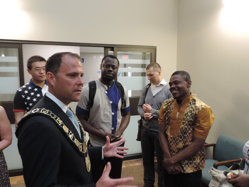 St. Catharines Mayor Walter Sendzik met with international graduate students at city hall.