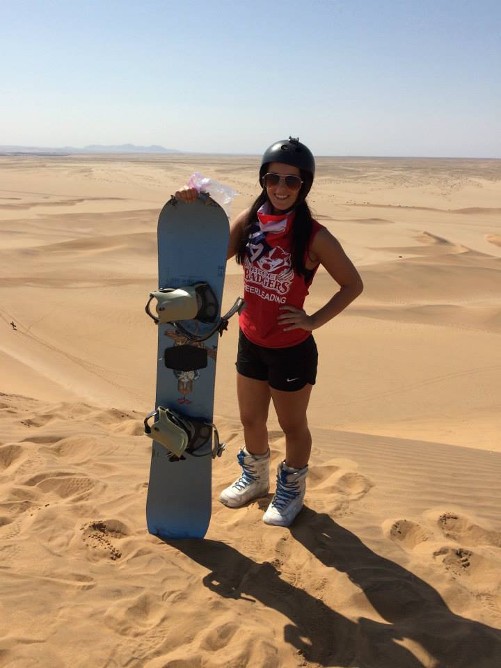 Child and Youth Studies major Meagan Bednarik tries out Sandboarding while in Namibia with Brock Abroad.