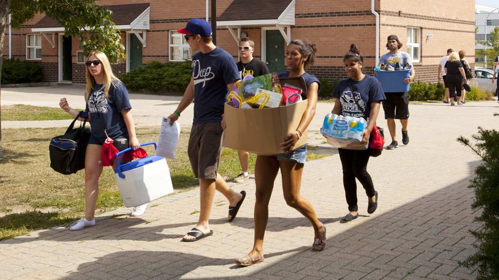Students haul boxes during Move-in Day in this file photo.
