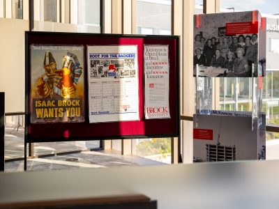 Displays of historical photos and posters at Brock University's 60th anniversary Skyline Celebration.