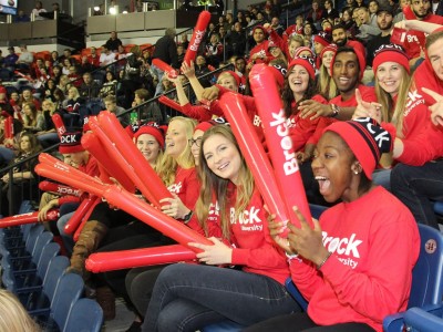Brock students cheering at an Ice Dogs game