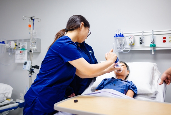 Nursing student working in the simulation lab