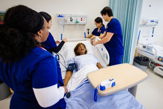 Nursing student working in the simulation lab