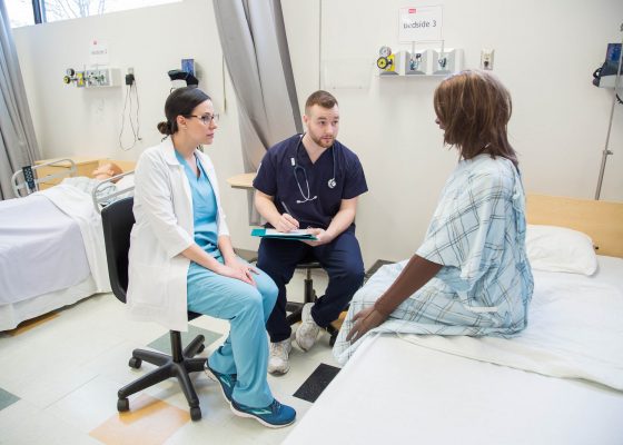 Nursing Instructor and Student in Lab