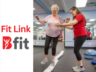 Fit Link image of student helping senior