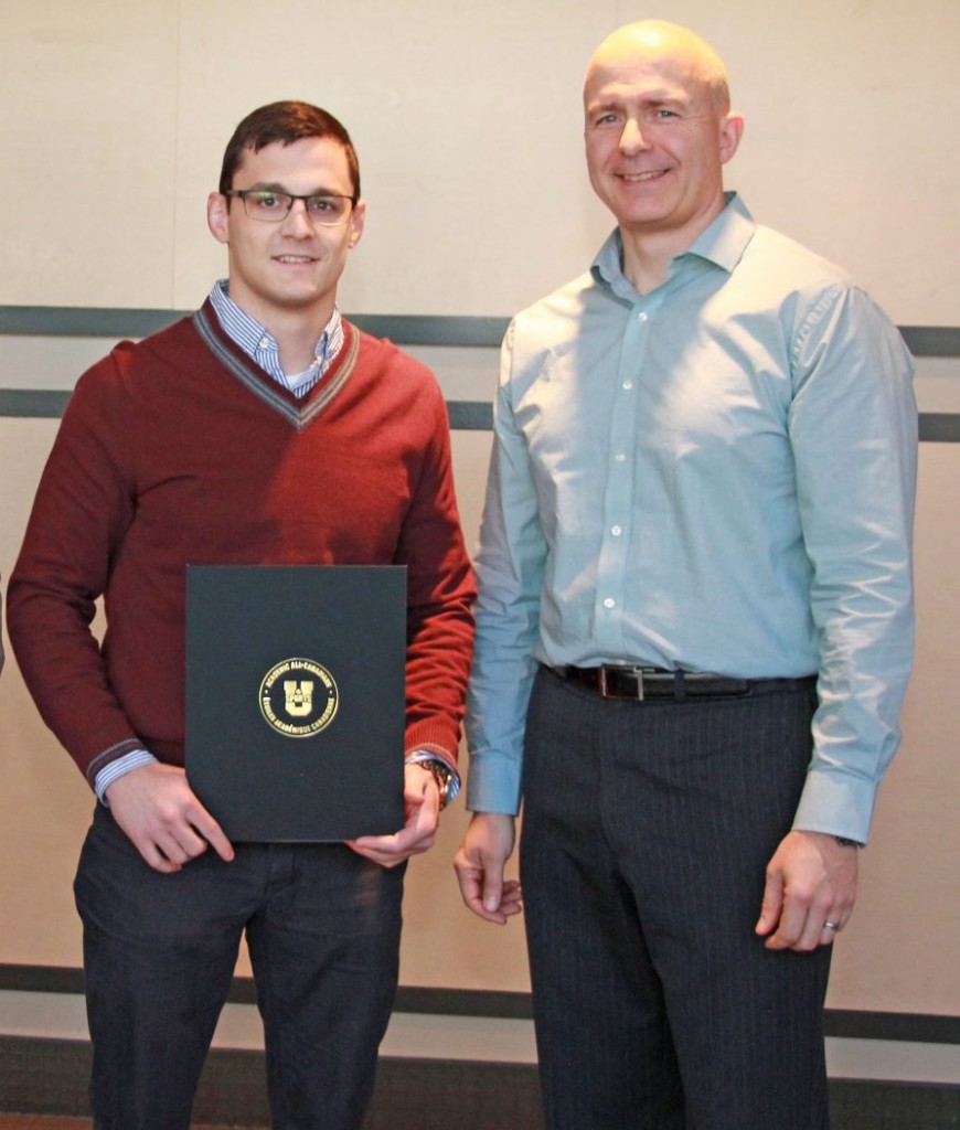 Matt Jagas, pictured here receiving an Academic All-Canadian Award from presenter Brian Roy, will graduate with a degree in history on Friday, June 8.